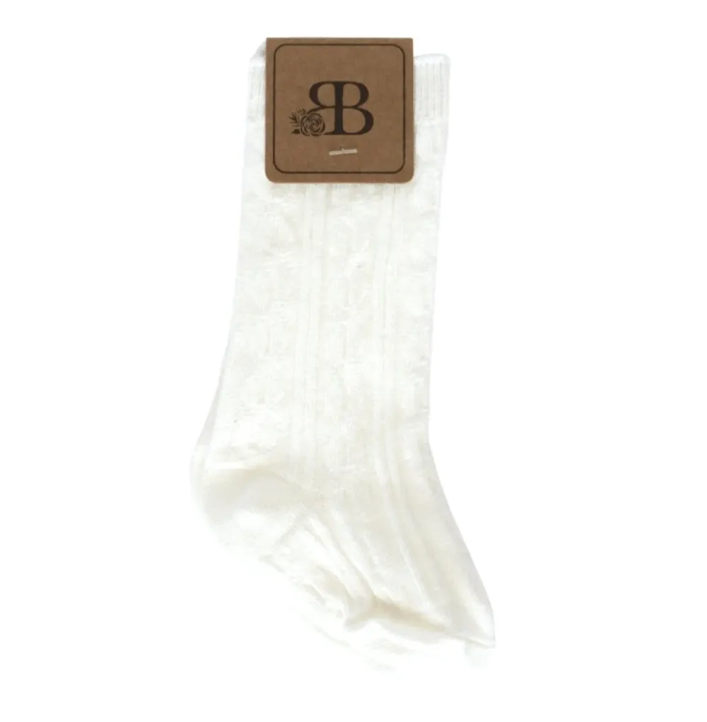 PEPPER KNEE-HIGH CABLE KNIT SOCKS